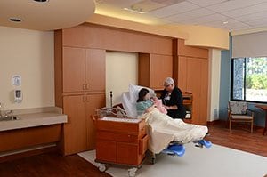 Birthing suite with a nursing mother