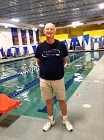 Reggie Parker in front of the swimming pool