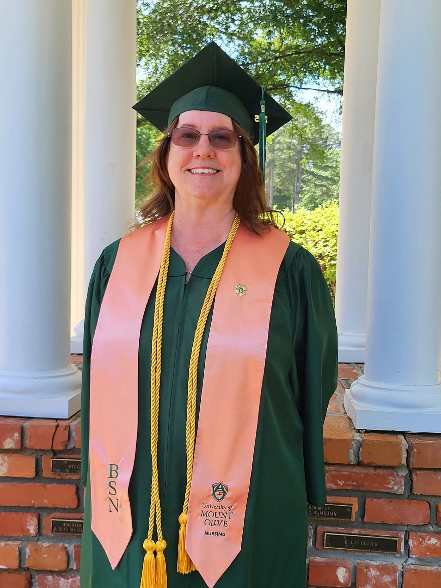 Deborah Stephenson in graduation cap and gown
