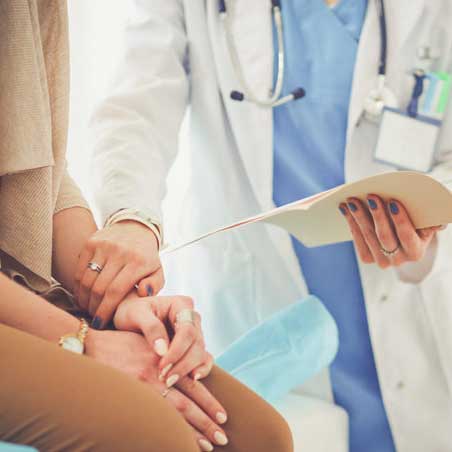 Woman at doctor.